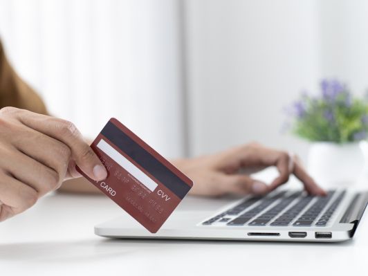 How can a credit card help you to build credit