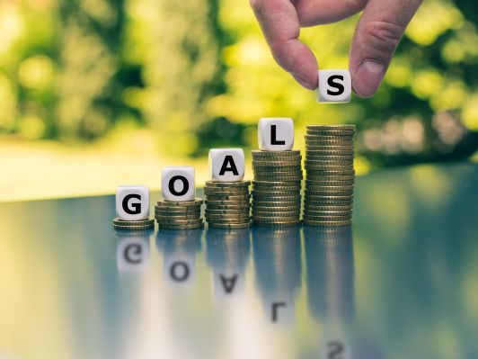 Setting realistic savings goals to save 5000 in a year